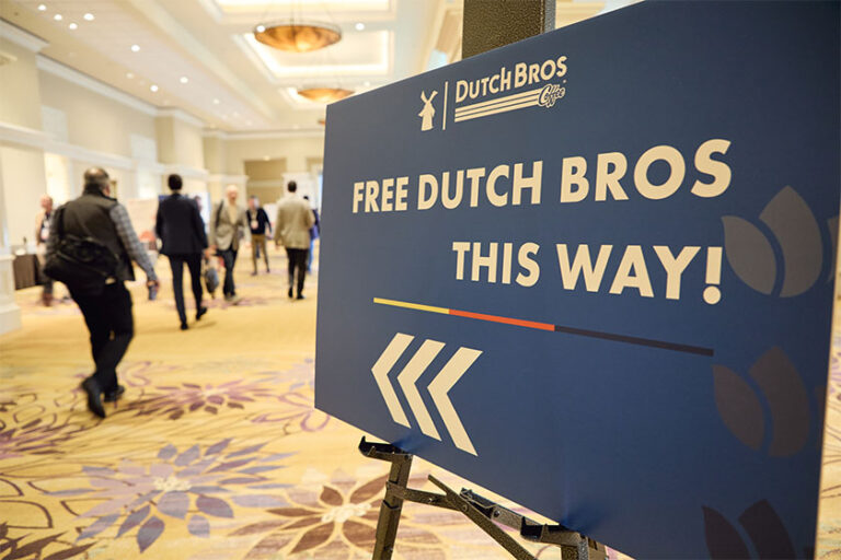 Sign that says "Free Dutch Bros this Way"